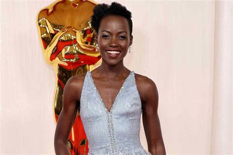 Lupita Nyongo Attends 2024 Oscars in a Meaningful Armani Gown Inspired