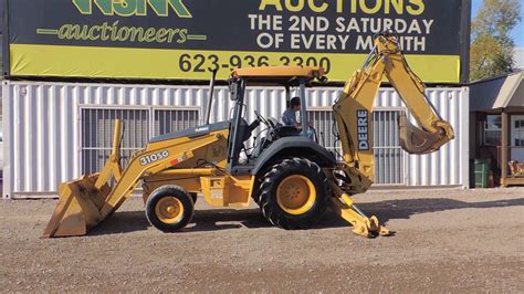 John Deere 310 SG Backhoe Loader W Extend A Hoe At Public Auction