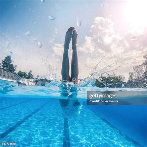 young women jumping  pool   premium high res pictures