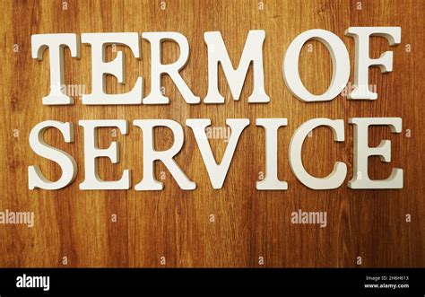 term  service word alphabet letters  wooden background stock photo