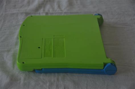 Leap Frog Leappad Console With 4 Books And Cartridges And Carrying Case