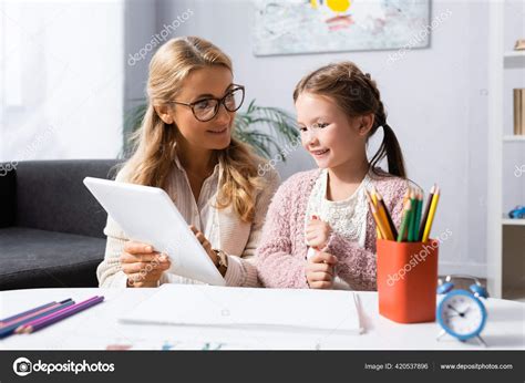 Blonde Woman Psychologist Showing Pictures Digital Tablet Stock Photo HayDmitriy