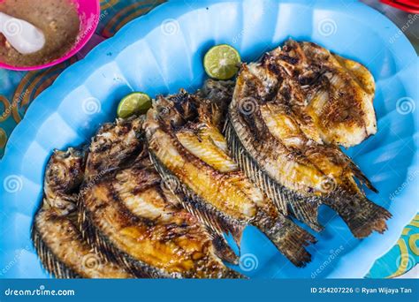 Asian Traditional Food Grilled Fish Or Ikan Bakar Served On The Table