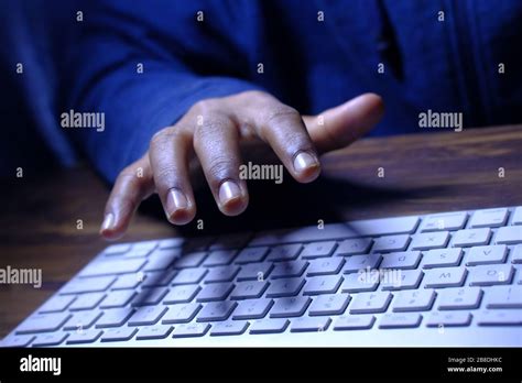 Close Up Of Hacker Hand Stealing Data Stock Photo Alamy