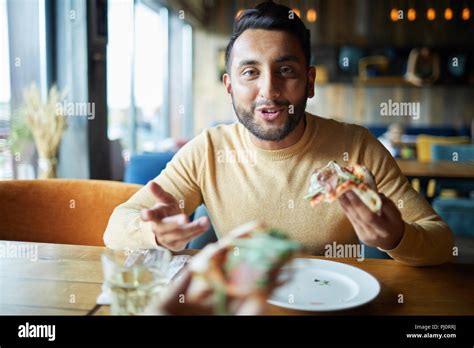 Talking While Eating Stock Photo Alamy