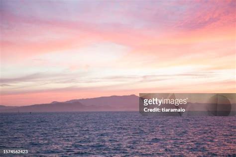 16726 Pink Sky Ocean Stock Photos High Res Pictures And Images