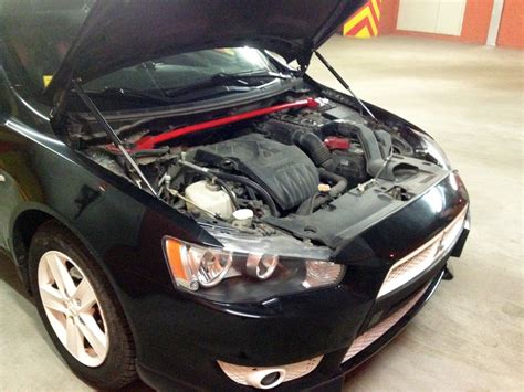 Как открыть капот лансер 10 - 89 фото