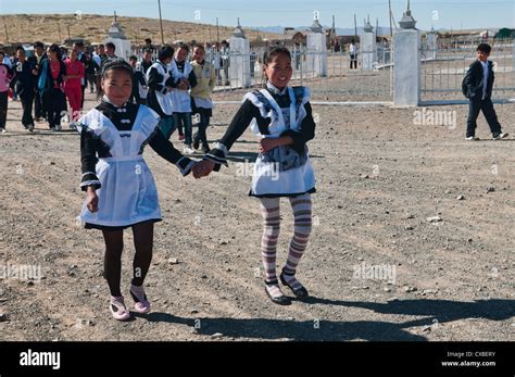 Mongolian girls in their French maid school uniforms in the Gobi Desert ...