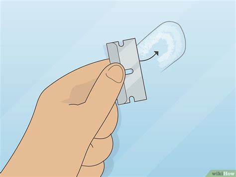 How To Remove A Rear View Mirror Mount And Windshield