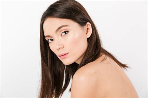 Premium Photo Half Turn Portrait Of Nude Asian Woman With Brown Long Hair Isolated Over White