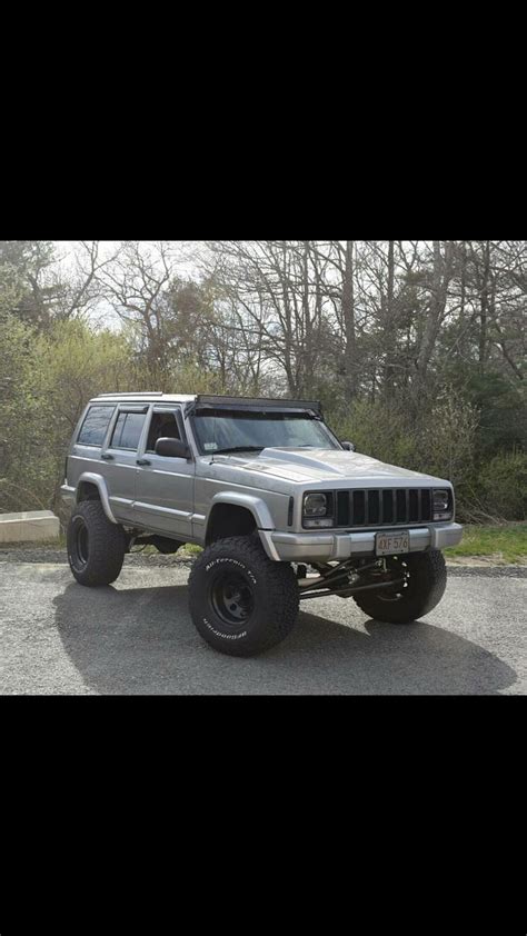 Jeep Xj Mods Silver Jeep Cherokee Xj On Parking Lot