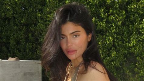 Kylie Jenner Shows Off Bare Butt And Skinnier Than Ever Waist In Gold Thong Bikini As Fans Spot