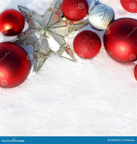 Red Christmas Bulbs and Star in White Snow Border Stock Photo - Image ...