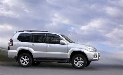 Toyota Land Cruiser Prado Standing In The Middle Of The Desert Stock