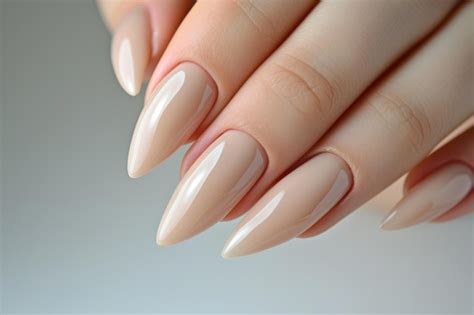 Premium Photo Closeup To Woman Hands With Elegant Neutral Colors Manicure Beautiful Nude
