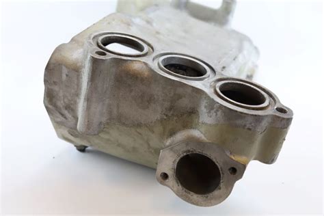 Engine oil heat exchanger housing - VME Trading