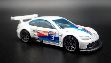 Машинка Базова Hot Wheels BMW M3 GT2 Race Day 1 64 GTC82 White купити в інтернет магазині