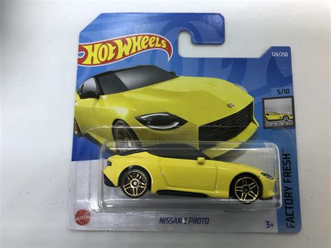 Hot Wheels Nissan Z Proto Yellow 124 250 Short Card HCT13 Amazon In Toys Games