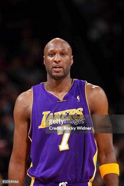 Lamar Odom Of The Los Angeles Lakers Looks On During The Game Against