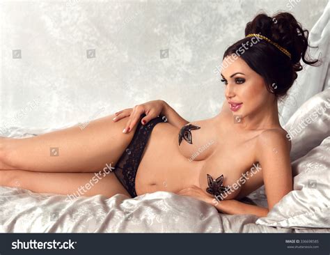 Sexy Brunette Woman Posing Laying On Stock Photo 336698585 Shutterstock