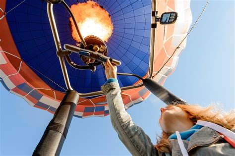 Premium Photo Low Angle View Of Woman In Hot Air Balloon