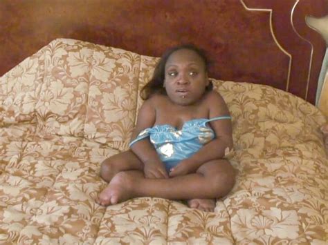 A Black Midget Gets Her Pussy Licked And Then Fucked In This Fetish Scene Heatwave