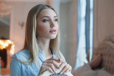 Portrait Of Perfect Fashion Model Woman With Blonde Hair And Makeup Indoor Portrait Stock Photo