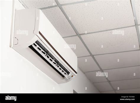 Modern air conditioner on wall Stock Photo - Alamy