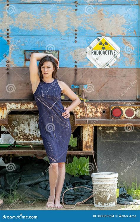 Campus Elegance Brunette Beauty Strikes A Pose Capturing The Essence Of Academic Glamour Stock