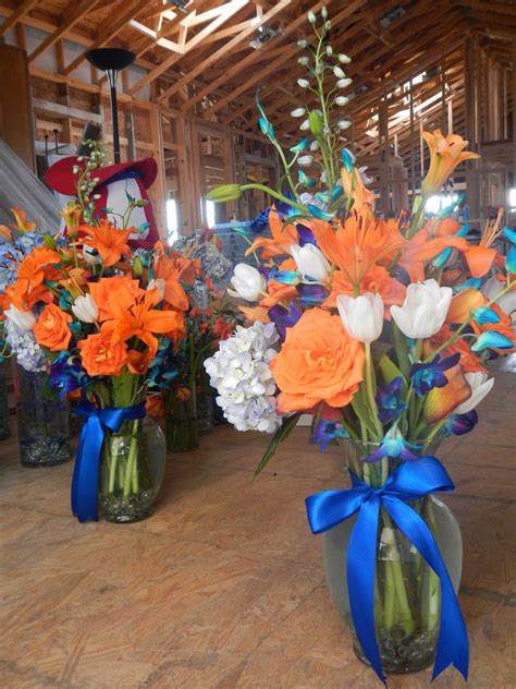 Vibrant Orange and Blue Wedding Flower Arrangements