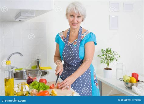 Mature Woman On The Kitchen Stock Photo Image Of Cheerful Gourmet
