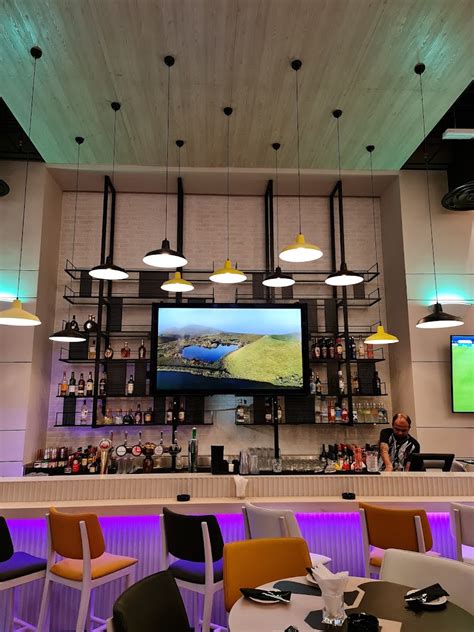 The Huddle Sports Bar & Grill (Sports Bars) in Bur Dubai | Get Contact