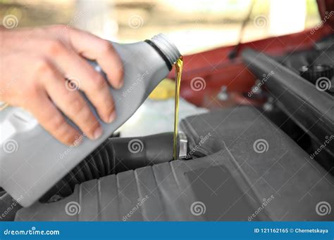 Mechanic Pouring Oil Into Car Engine Stock Image Image Of Motor