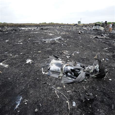 EN IMAGES Crash avion Malaysia Airlines scène de désolation sur la