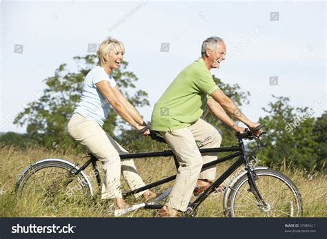 Mature Couple Riding Tandem Stock Photo 37985611 Shutterstock
