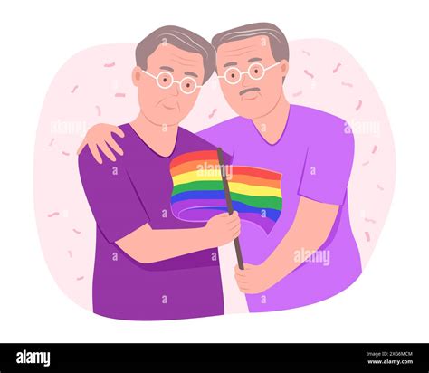 Senior Gay Men Couple Holding The LGBT Rainbow Flag For Gay Pride Celebration Concept