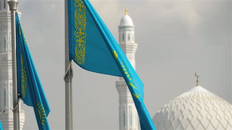 Flags Of Republic Of Kazakhstan On The Background Dome And Towers Of