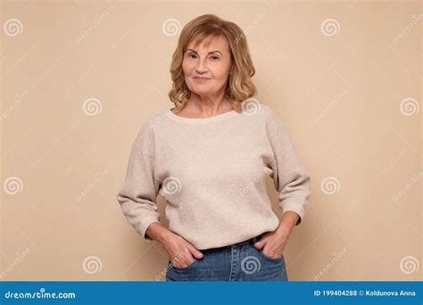 Confident Mature Woman Looking At Camera And Smiling Stock Photo Image Of Lady Cheerful