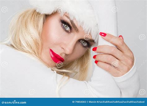 Beautiful Blonde Female Model Dressed As Santa Claus In A Red Cap Stock Image Image Of