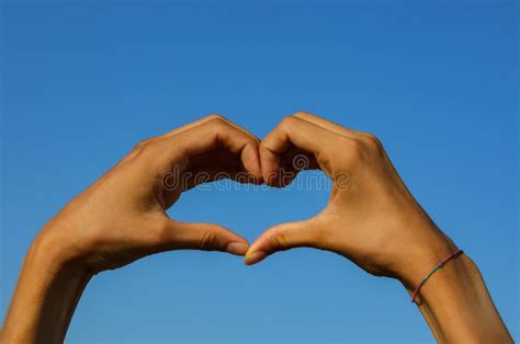 Two Joined Hands Forming A Heart On The Sky Stock Image Image Of