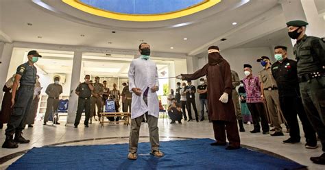 Two Men Publicly Caned 77 Times For Having Sex In Indonesia