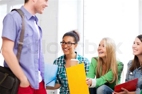 Students Communicating And Laughing At School Stock Image Colourbox