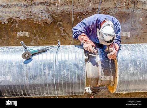 Welder Welding Pipe