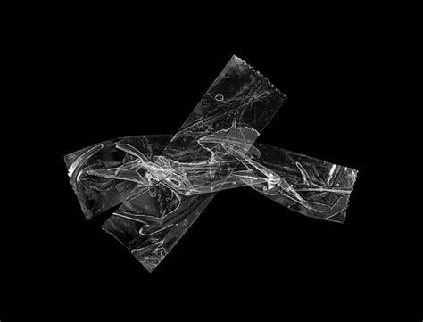 Premium Photo Adhesive Plastic Tape Isolated On Black Background