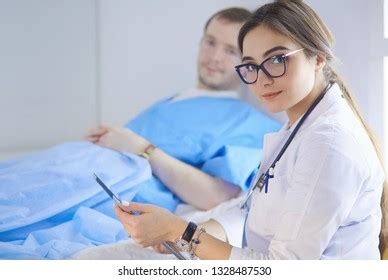 Doctor Nurse Talking Patient Hospital Stock Photo 1328487530 | Shutterstock