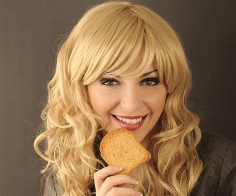 Young Woman Eating Toast The Alternative Daily