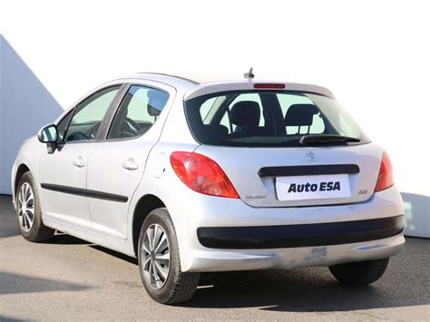 Download Sleek Peugeot 207 In Its Prime Wallpaper | Wallpapers.com