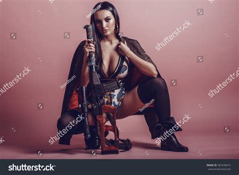 Hot Sexy Brunette Girl Gun On Stock Photo Shutterstock
