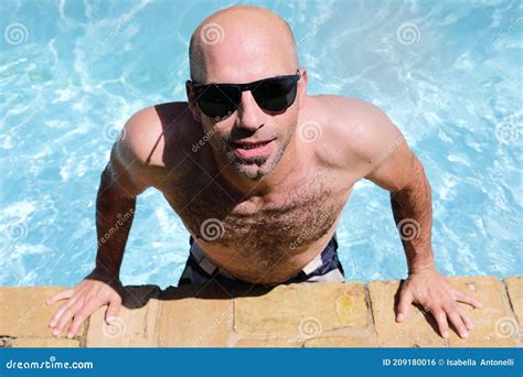 Handsome Guy Half Naked Cheerful Man Smiling Laughing In Blue Water Swimming Pool Stock Photo