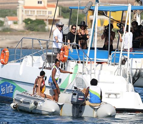 Britain S Next Top Model S Abbey Clancy Strips To A Bikini Daily Mail Online